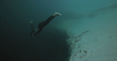 Travel To The Bottom Of The Ocean As A Freediver Descends An Underwater Chasm: Hypnotically Beautiful