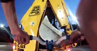 Watch A Fixie Rider Slam Into The Back Of A Backhoe. FAIL!