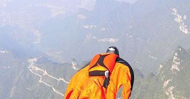 Watch An Insane Wingsuiter Do The "Avalanche Line" In The Alps - NUTS!!!