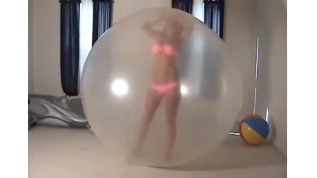 Look at that Babe Stuck in a Giant Balloon! [Video]